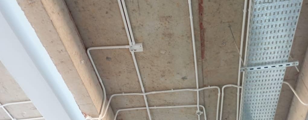 Surface-mounted electrical containment and conduit routing installed by FlowTech